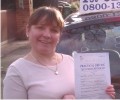 Diane with Driving test pass certificate